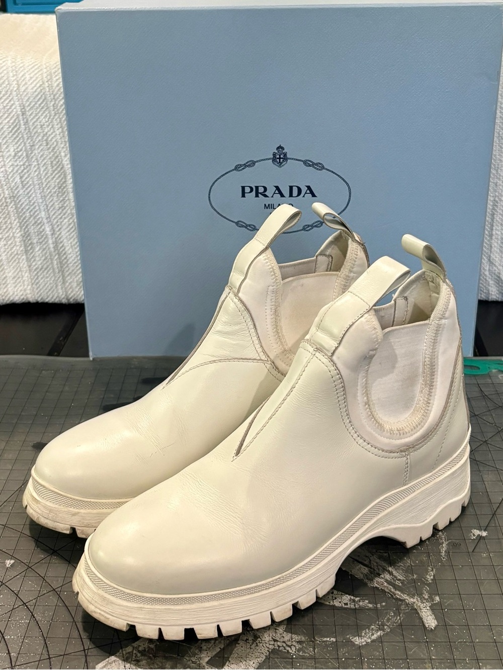 Prada Off-White Leather Chelsea Lug Ankle Boots